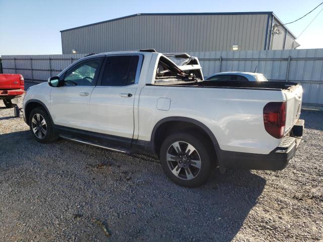 Photo 2 from auction – 2017 HONDA RIDGELINE with VIN 5FPYK3F50HB011912