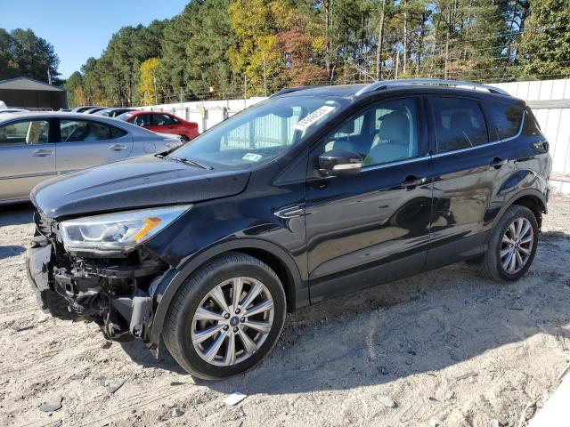 FORD ESCAPE TIT 2017 with VIN 1FMCU9J90HUB58406 - Photo from auction