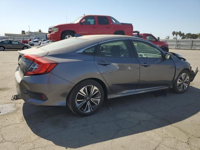 Photo 3 from auction – 2018 HONDA CIVIC EX with VIN JHMFC1F39JX039105