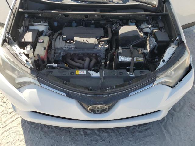 Photo 12 from auction – 2018 TOYOTA RAV4 LE with VIN JTMZFREV2JJ158723