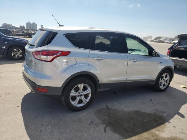 Photo 3 from auction – 2016 FORD ESCAPE SE with VIN 1FMCU0G99GUA32496