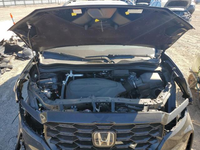 Photo 11 from auction – 2023 HONDA PASSPORT E with VIN 5FNYF8H03PB013776