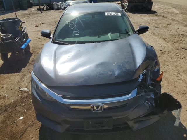 Photo 11 from auction – 2017 HONDA CIVIC EX with VIN 19XFC2F77HE077775