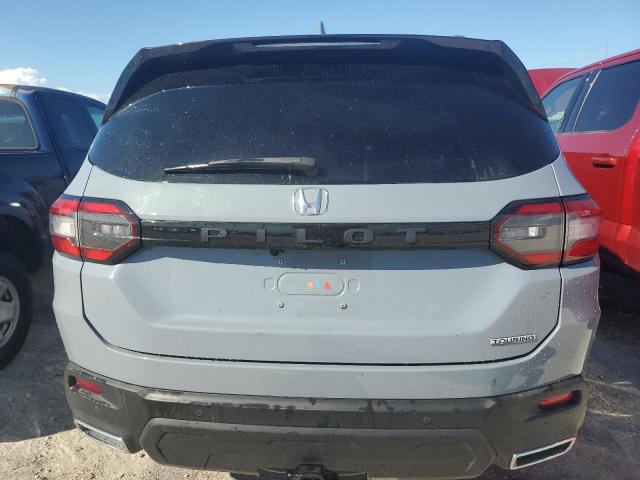 Photo 6 from auction – 2023 HONDA PILOT TOUR with VIN 5FNYG2H72PB003263