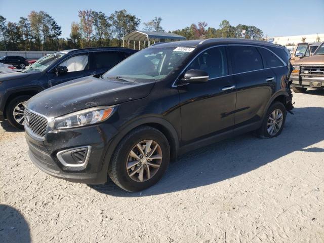 KIA SORENTO LX 2016 with VIN 5XYPG4A52JG394429 - Photo from auction