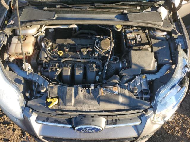 Photo 11 from auction – 2014 FORD FOCUS SE with VIN 1FADP3F24EL371990