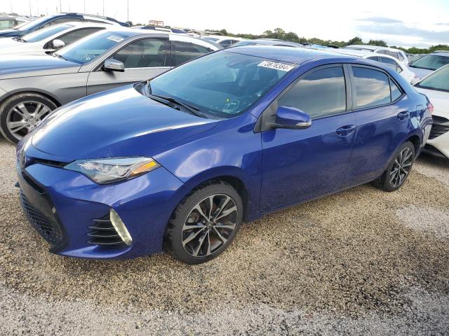 TOYOTA COROLLA L 2019 with VIN 5YFBURHE6KP869261 - Photo from auction