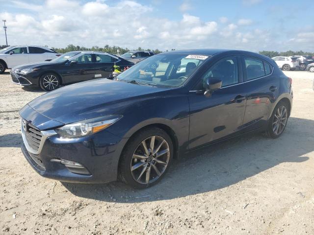 MAZDA 3 TOURING 2018 with VIN 3MZBN1L33JM252424 - Photo from auction