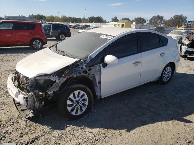 TOYOTA PRIUS PLUG 2014 with VIN JTDKN3DP8E3063243 - Photo from auction