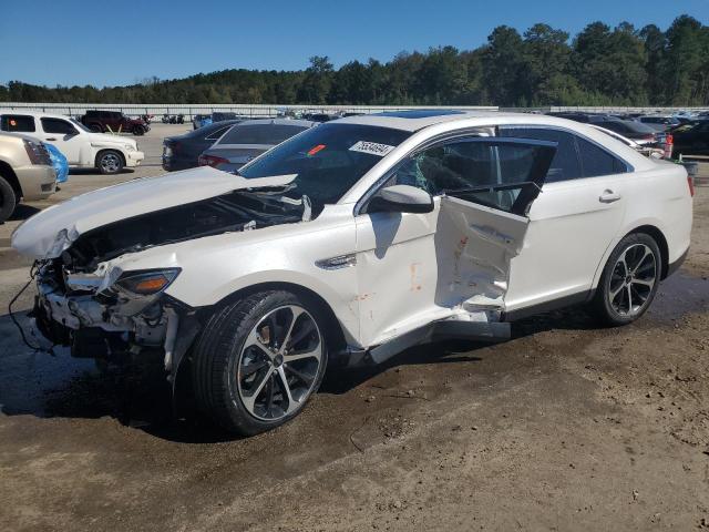FORD TAURUS SEL 2015 with VIN 1FAHP2E8XFG123612 - Photo from auction