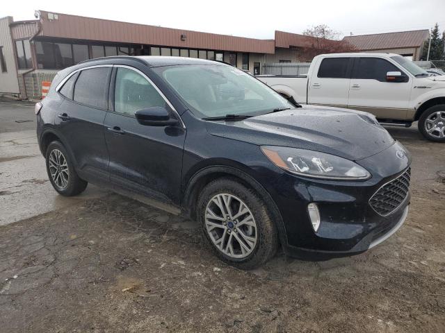 Photo 4 from auction – 2021 FORD ESCAPE SEL with VIN 1FMCU9CZ2MUA86082