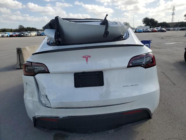 Photo 6 from auction – 2023 TESLA MODEL Y with VIN 7SAYGDEE5PA083009