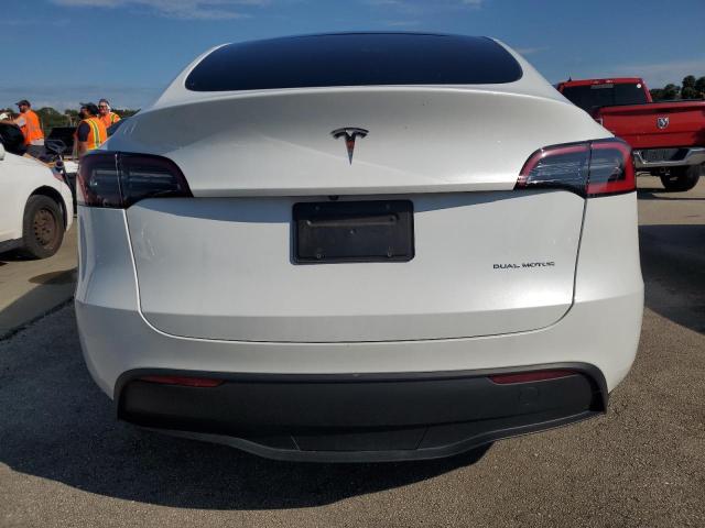 Photo 6 from auction – 2023 TESLA MODEL Y with VIN 7SAYGDEE1PA060777