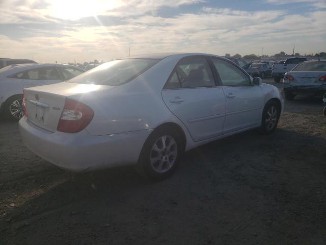 Photo 3 from auction – 2004 TOYOTA CAMRY LE with VIN JTDBE30KX40266872