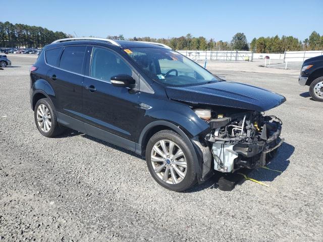 Photo 4 from auction – 2017 FORD ESCAPE TIT with VIN 1FMCU9J99HUC07795
