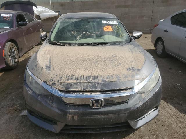 Photo 5 from auction – 2016 HONDA CIVIC LX with VIN 19XFC2F51GE081656