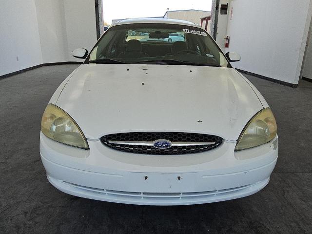 Photo 5 from auction – 2002 FORD TAURUS SE with VIN 1FAFP53UX2A119999