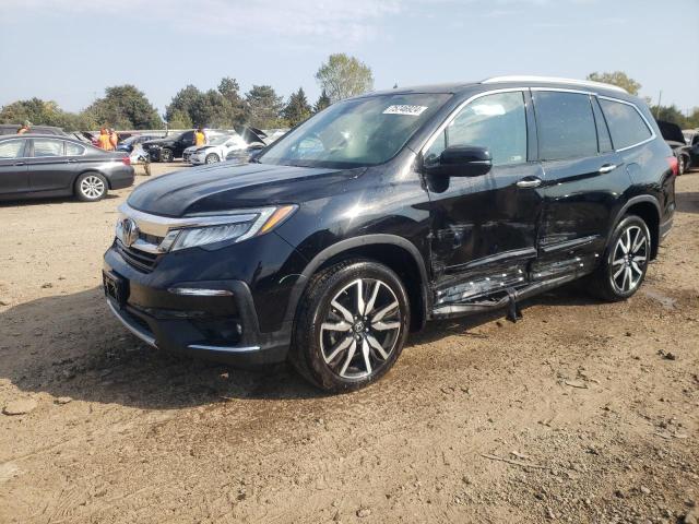 HONDA PILOT ELIT 2021 with VIN 5FNYF6H06MB023265 - Photo from auction