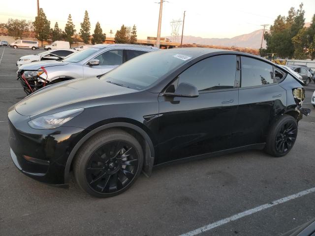 TESLA MODEL Y 2021 with VIN 5YJYGDEE8MF076504 - Photo from auction