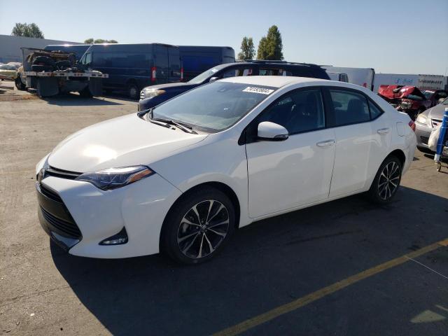 TOYOTA COROLLA L 2018 with VIN 2T1BURHE1JC979603 - Photo from auction