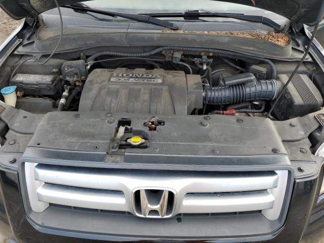 Photo 12 from auction – 2006 HONDA PILOT EX with VIN 2HKYF18546H542883