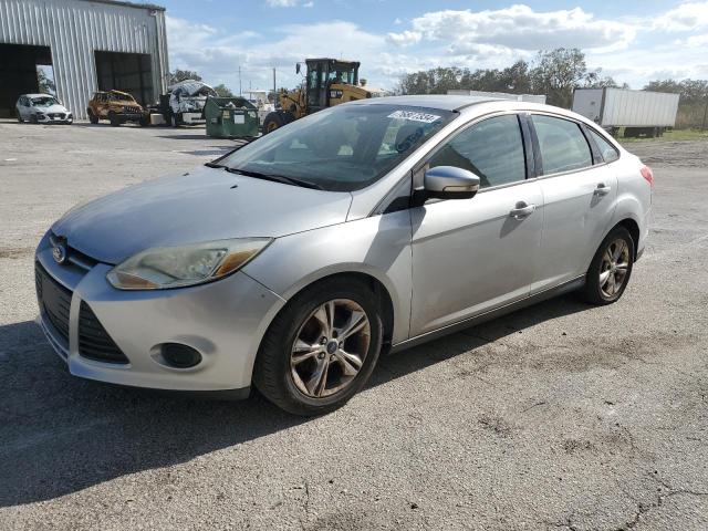 FORD FOCUS SE 2013 with VIN 1FADP3F22DL288136 - Photo from auction