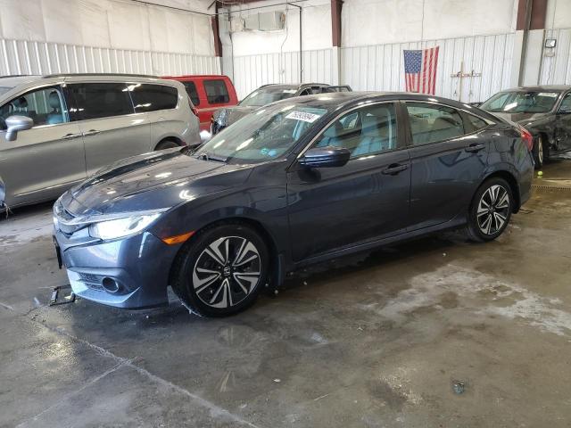 HONDA CIVIC EXL 2017 with VIN 19XFC1F73HE011301 - Photo from auction