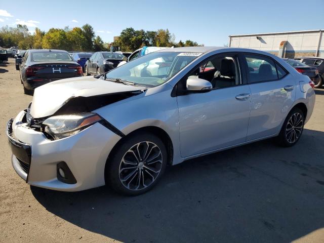 TOYOTA COROLLA L 2015 with VIN 2T1BURHE0FC305563 - Photo from auction