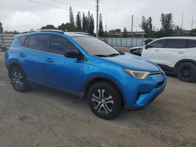 Photo 4 from auction – 2016 TOYOTA RAV4 LE with VIN JTMZFREV9GJ077257