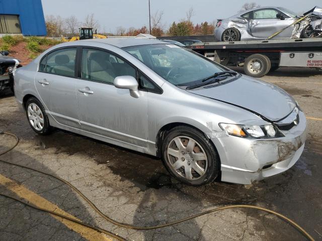 Photo 4 from auction – 2010 HONDA CIVIC LX with VIN 19XFA1F55AE027171