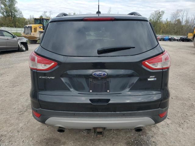Photo 6 from auction – 2014 FORD ESCAPE SE with VIN 1FMCU9G92EUD99306