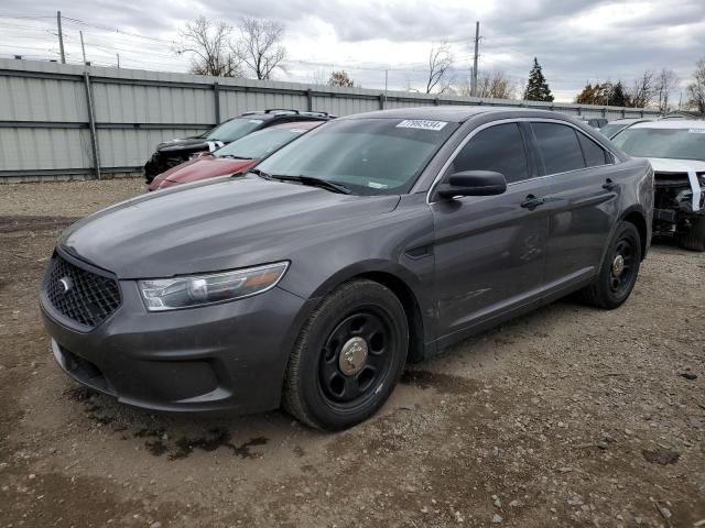 FORD TAURUS POL 2015 with VIN 1FAHP2MK0FG142411 - Photo from auction