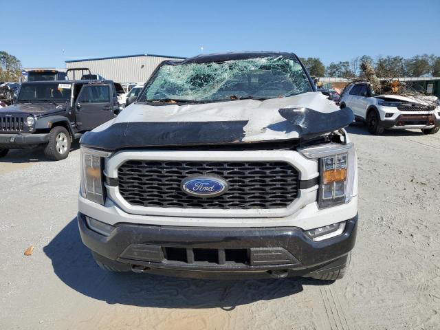 Photo 5 from auction – 2023 FORD F150 SUPER with VIN 1FTFW1E8XPKD44060