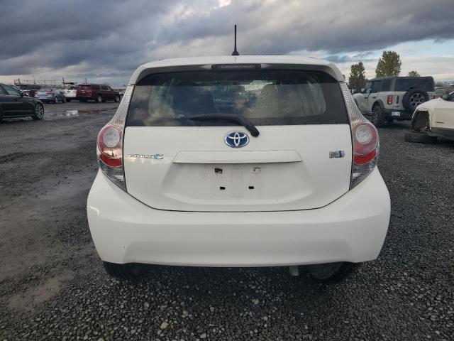 Photo 6 from auction – 2014 TOYOTA PRIUS C with VIN JTDKDTB33E1084662