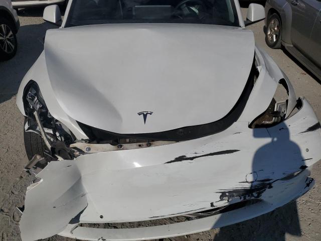 Photo 11 from auction – 2021 TESLA MODEL Y with VIN 5YJYGDEE5MF081658