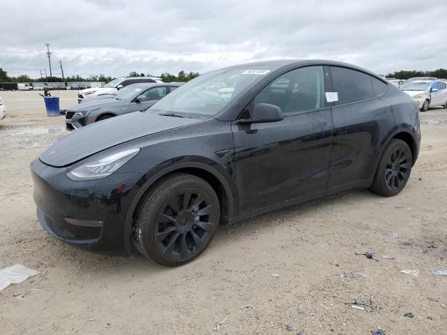 TESLA MODEL Y 2023 with VIN 7SAYGDEE8PA086812 - Photo from auction