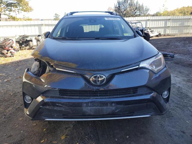 Photo 5 from auction – 2017 TOYOTA RAV4 XLE with VIN JTMRFREV2HD217326