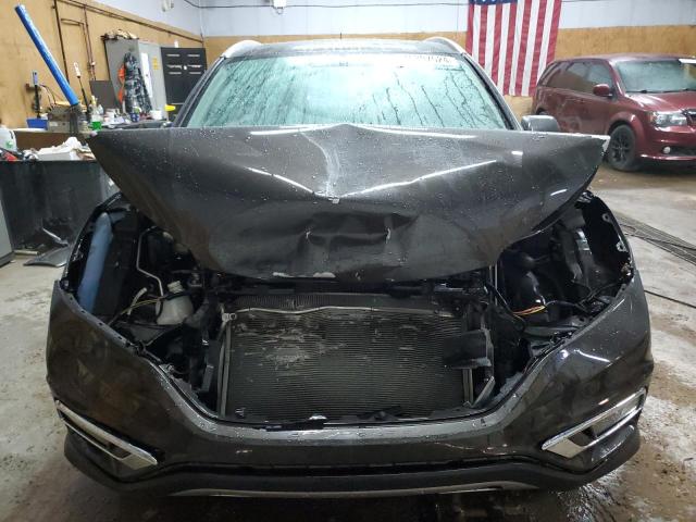 Photo 5 from auction – 2015 HONDA CR-V EXL with VIN 2HKRM4H79FH666354