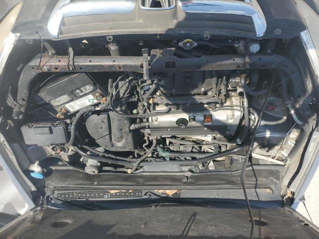 Photo 11 from auction – 2004 HONDA CR-V LX with VIN JHLRD68474C012112