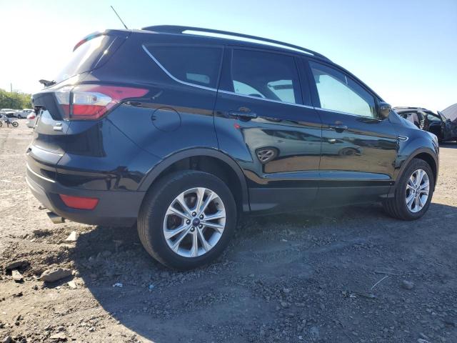 Photo 3 from auction – 2018 FORD ESCAPE SE with VIN 1FMCU0GD0JUB94190