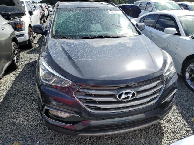 Photo 5 from auction – 2017 HYUNDAI SANTA FE S with VIN 5NMZU3LB6HH027550
