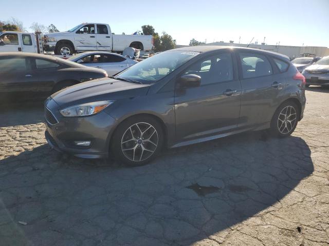 FORD FOCUS SE 2015 with VIN 1FADP3K20FL358001 - Photo from auction