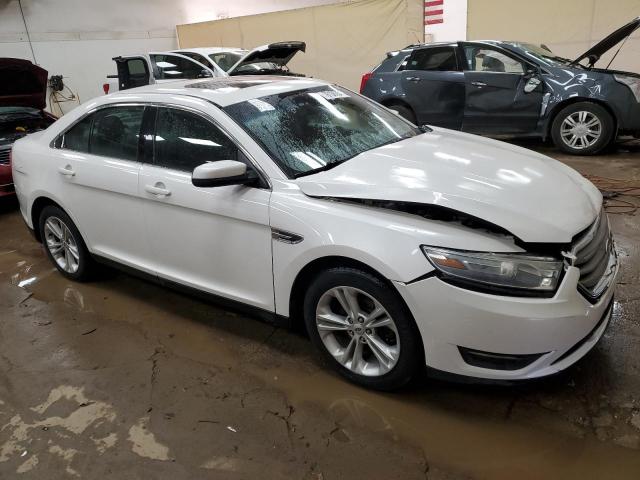 Photo 4 from auction – 2014 FORD TAURUS SEL with VIN 1FAHP2E81EG100363