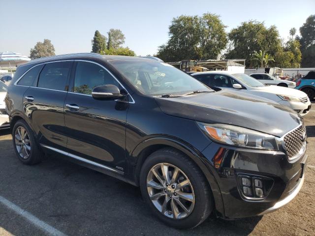 Photo 4 from auction – 2016 KIA SORENTO SX with VIN 5XYPKDA56GG043143