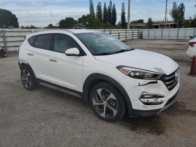 Photo 4 from auction – 2018 HYUNDAI TUCSON VAL with VIN KM8J3CA29JU708508