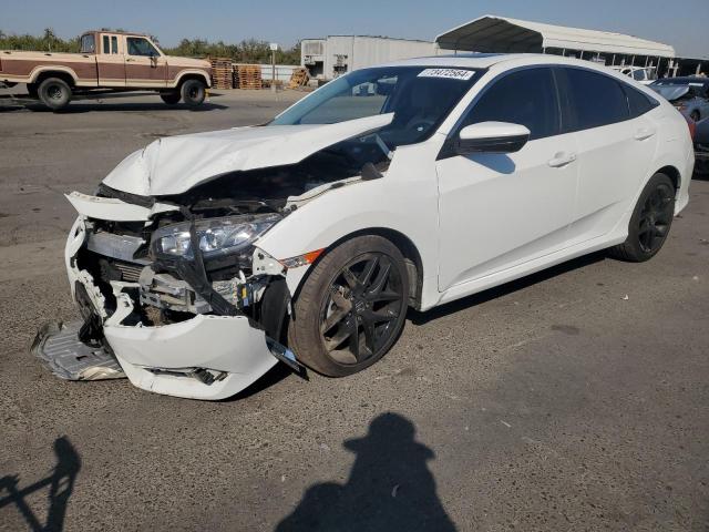 HONDA CIVIC EX 2018 with VIN JHMFC1F3XJX030266 - Photo from auction