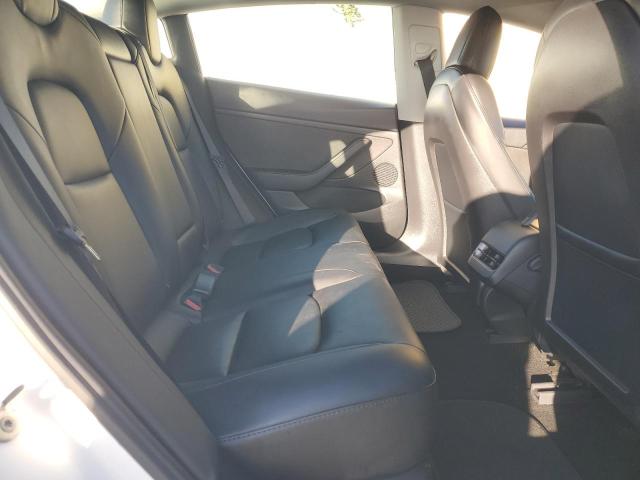 Photo 10 from auction – 2021 TESLA MODEL 3 with VIN 5YJ3E1EA8MF986293