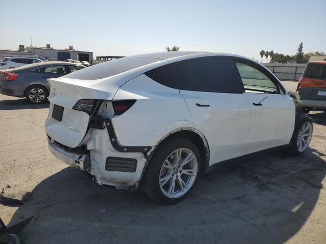 Photo 3 from auction – 2022 TESLA MODEL Y with VIN 7SAYGAEE0NF494123