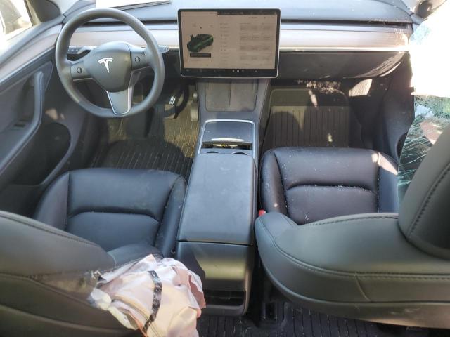 Photo 8 from auction – 2023 TESLA MODEL Y with VIN 7SAYGAEE7PF929304
