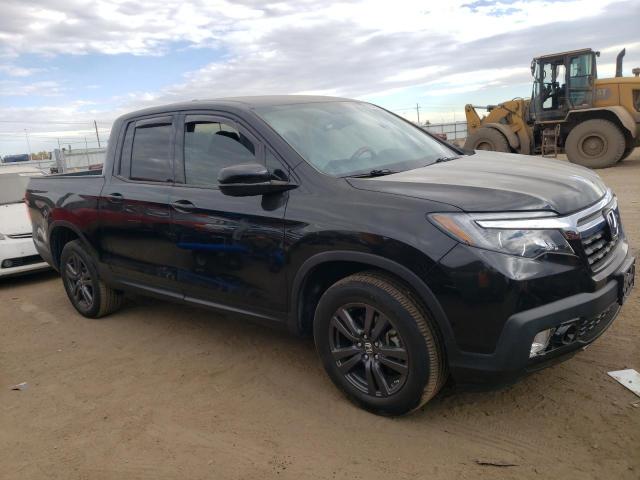 Photo 4 from auction – 2019 HONDA RIDGELINE with VIN 5FPYK3F11KB011891